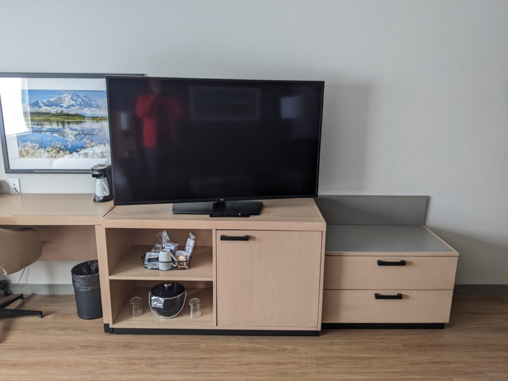 Hyatt Place Fairbanks Alaska TV and stand.