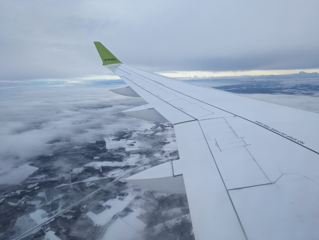 airBaltic A220-300 Window View Landing