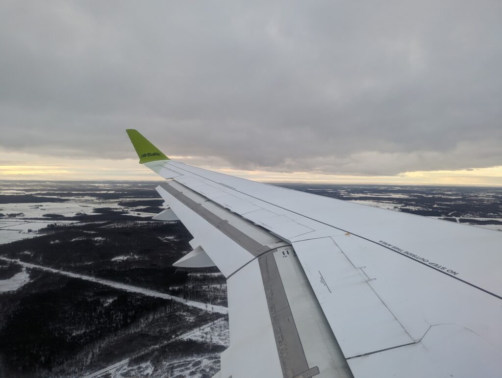 airBaltic A220-300 Window View Landing