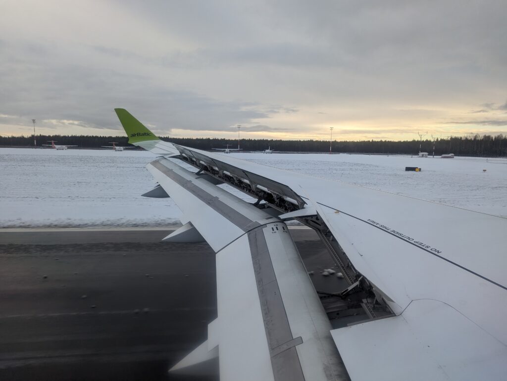 airBaltic A220-300 Window View Landing