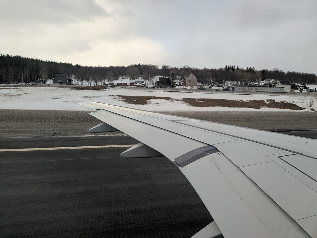 Widerøe E190 Takeoff Window View